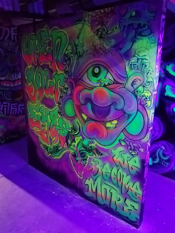 Open Your Eyes - Blacklight UV mural by Become More in Union Station - Graffiti Attic KC
